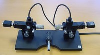 Double incident light microscope for shaver blade inspection